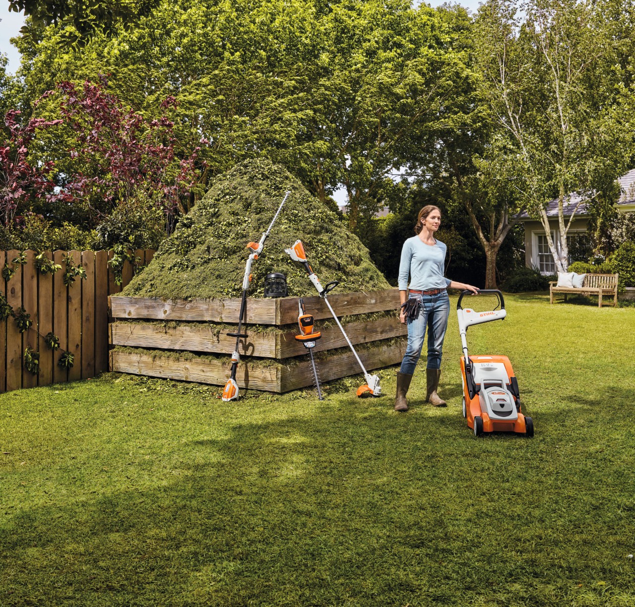 Woman gardening with AK battery range
