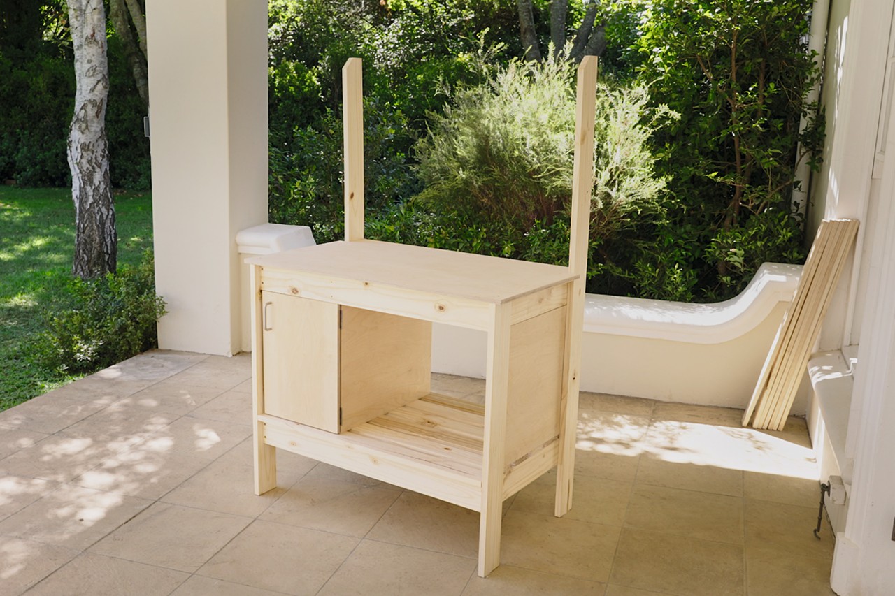 Potting bench with newly fitted door and worktop