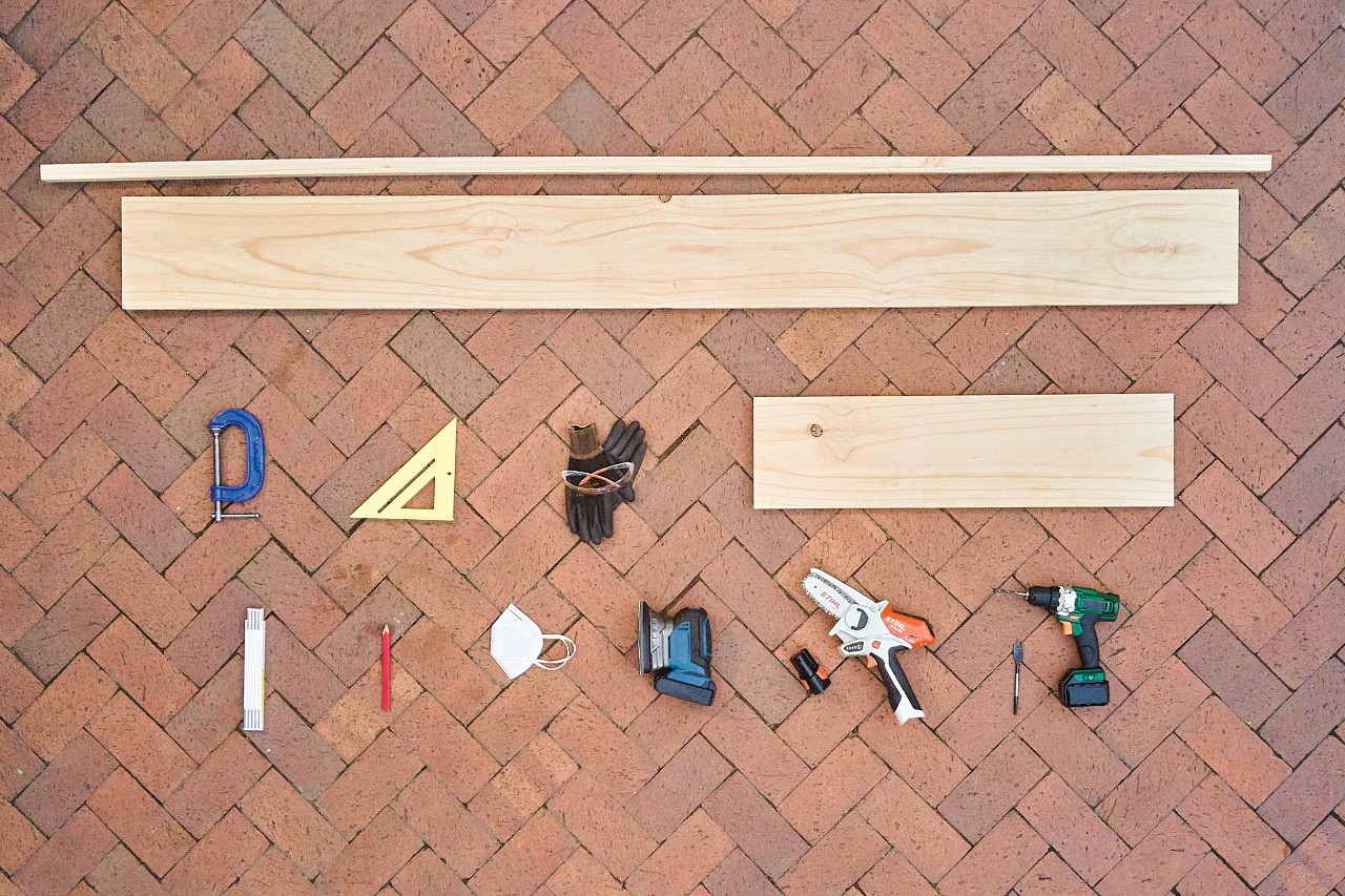 Tools and aids to make a DIY garden power tool storage rack, including the STIHL GTA 26 cordless garden pruner