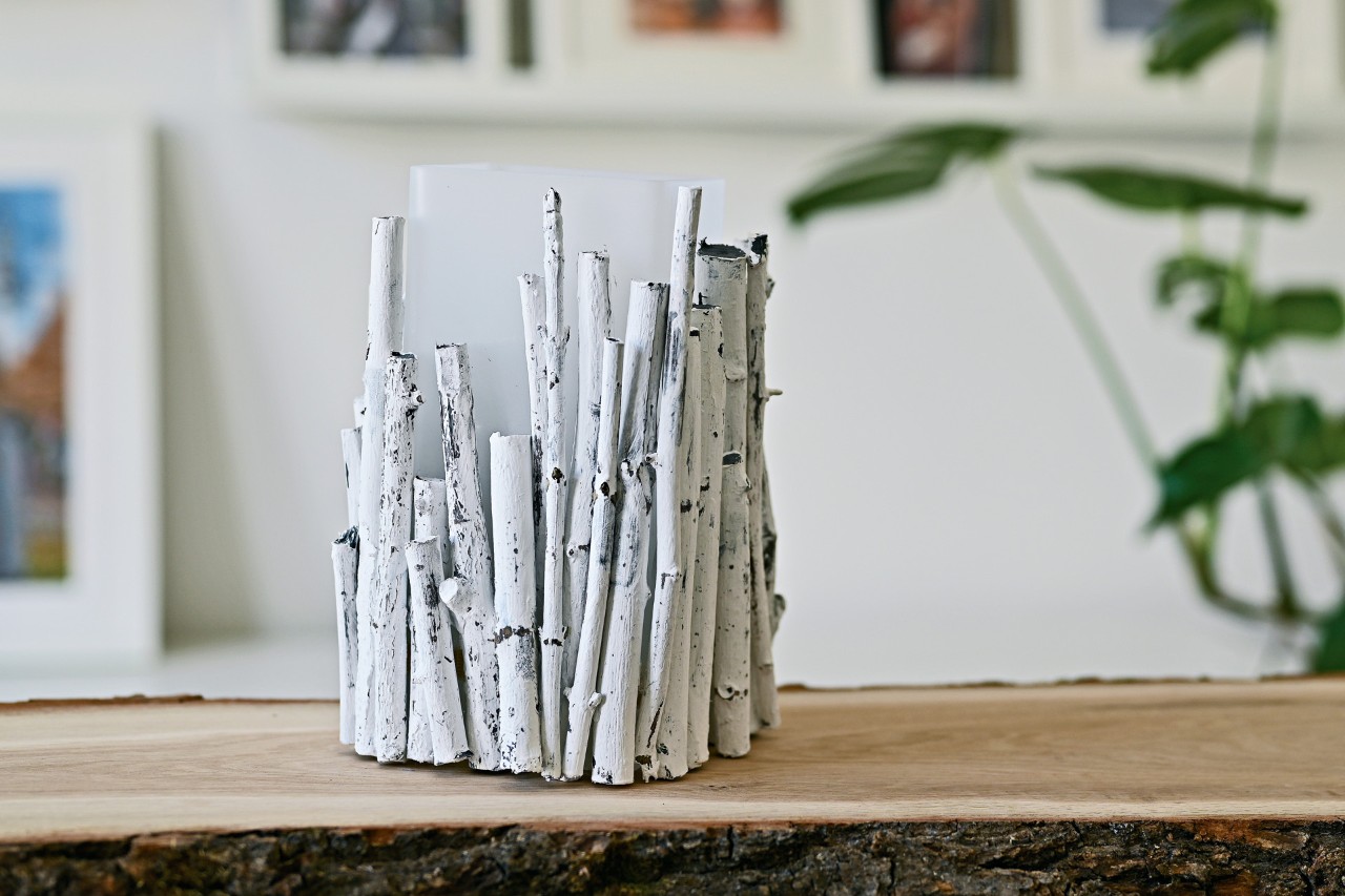 A DIY table lamp made with twigs