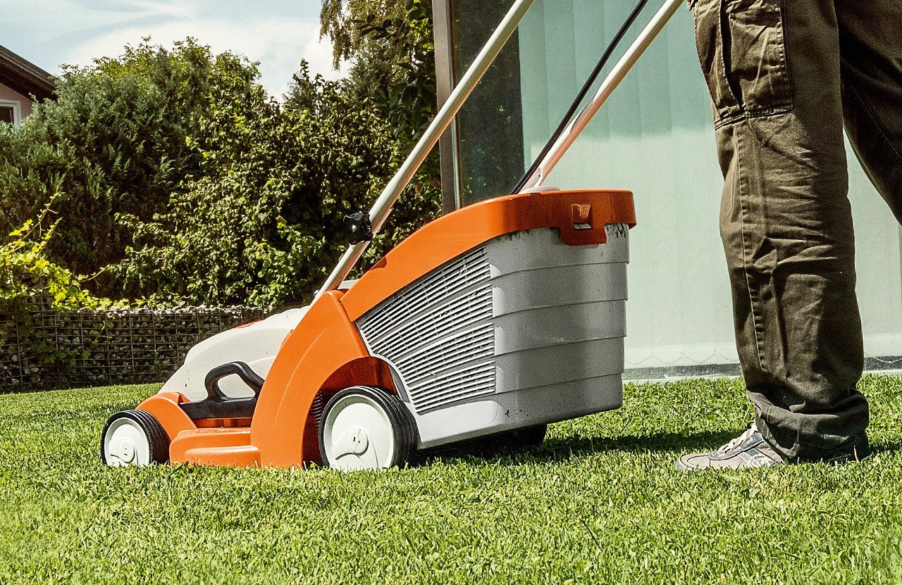 STIHL RMA 339 cordless lawn mower on green lawn