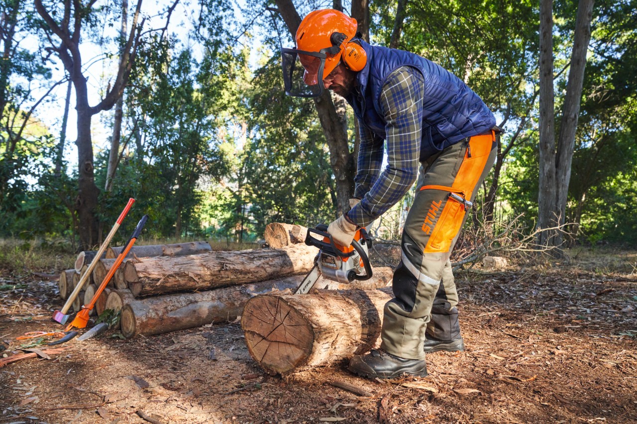 Worker with a chainsaw